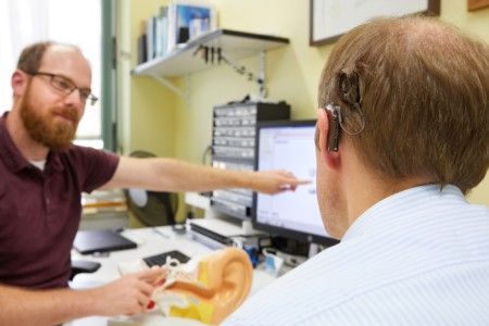 Patient with cochlear implant during follow-up care in the UKR